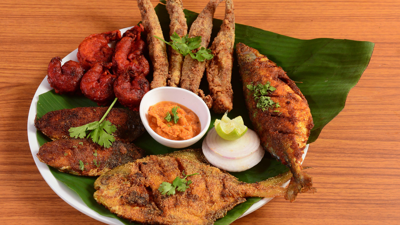 savouring the sea: 9 iconic seafood destinations in anjuna beach, goa